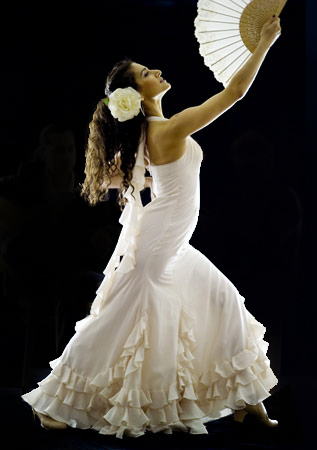Flamenco Dancer in white flamenco dress